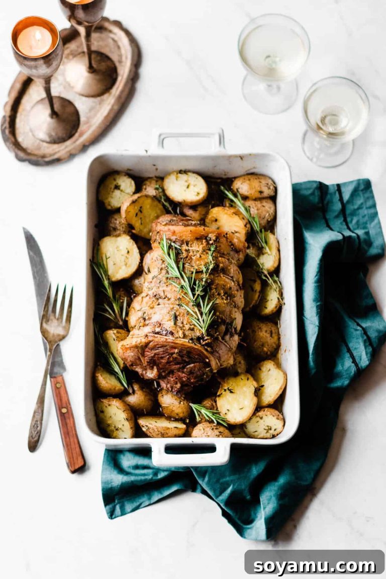 Slow-Roasted Lamb with Herb Garlic Butter Potatoes 22 Slow-Roasted Lamb with Herb Garlic Butter Potatoes