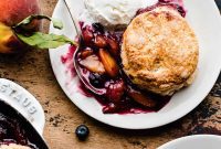 Golden Peach and Blueberry Cobbler with Fluffy Buttermilk Biscuits