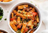 Sausage Rigatoni with Roasted Peppers and Burst Tomatoes