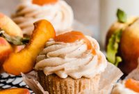Luscious Peach Cupcakes Crowned with Cinnamon Cream Cheese Frosting