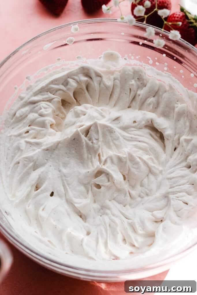 Sun-Kissed Strawberry Shortcakes with Dreamy Whipped Cream 11 A bowl of whipped cream.