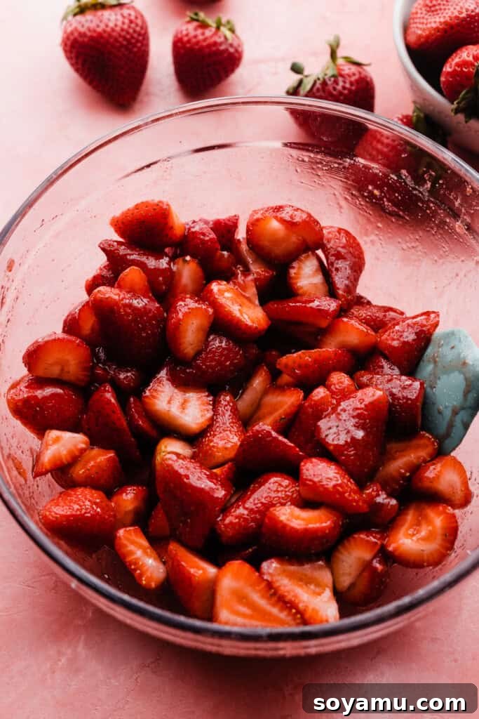 Sun-Kissed Strawberry Shortcakes with Dreamy Whipped Cream 5 A bowl of juicy strawberries.