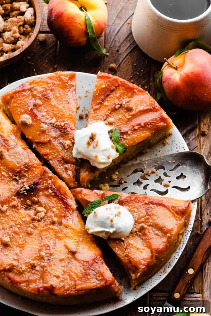 Caramelized Peach Cobbler Flip 11 Slices of peach upside down cake topped with whipped cream and streusel.