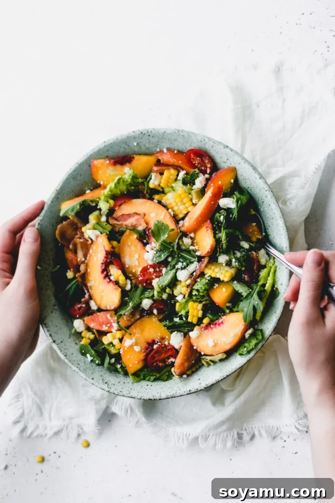 A large bowl of peach nectarine salad, perfect for family-style serving.