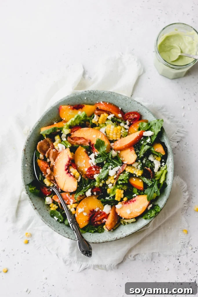 Another perspective of the peach nectarine salad in a bowl.