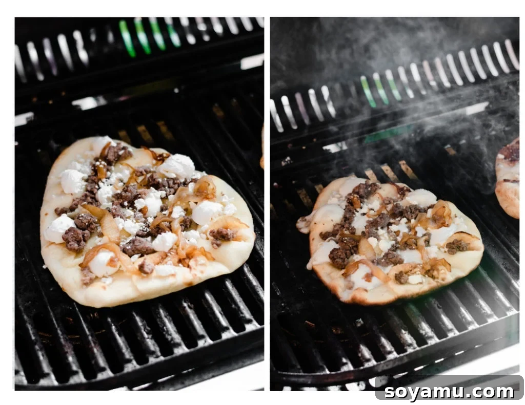 Grilled naan pizzas with melted cheese, ground lamb, and caramelized onions cooking on a barbecue grill