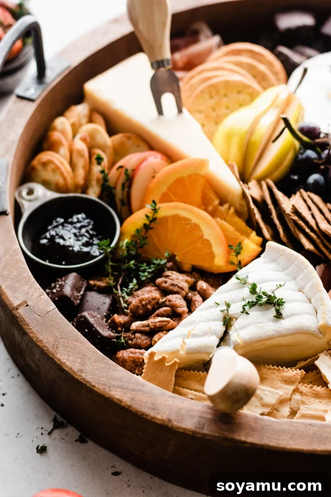 Fall Harvest Cheese Board - A delectable close-up of autumn flavors. A close-up shot of a section of the fall charcuterie board, highlighting a variety of cheeses, vibrant fresh fruits like figs and grapes, and gourmet crackers, all artfully arranged.