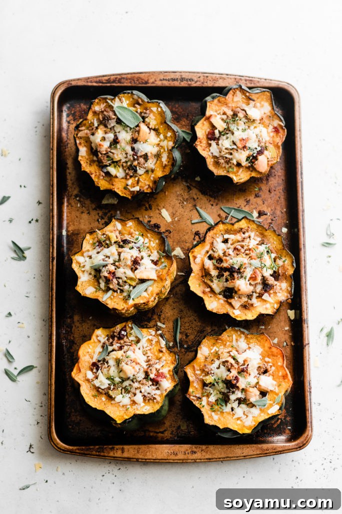 A Pan of Holiday Perfection: Stuffed Acorn Squash Ready to Serve. A large baking pan holds several stuffed acorn squash halves, their rich filling slightly overflowing, golden and inviting.