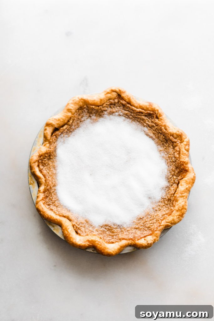 Ready to brûlée: Maple Pie with a pristine layer of sugar Maple Pie with a pre-brûlée sugar topping, showing the even layer of granulated sugar