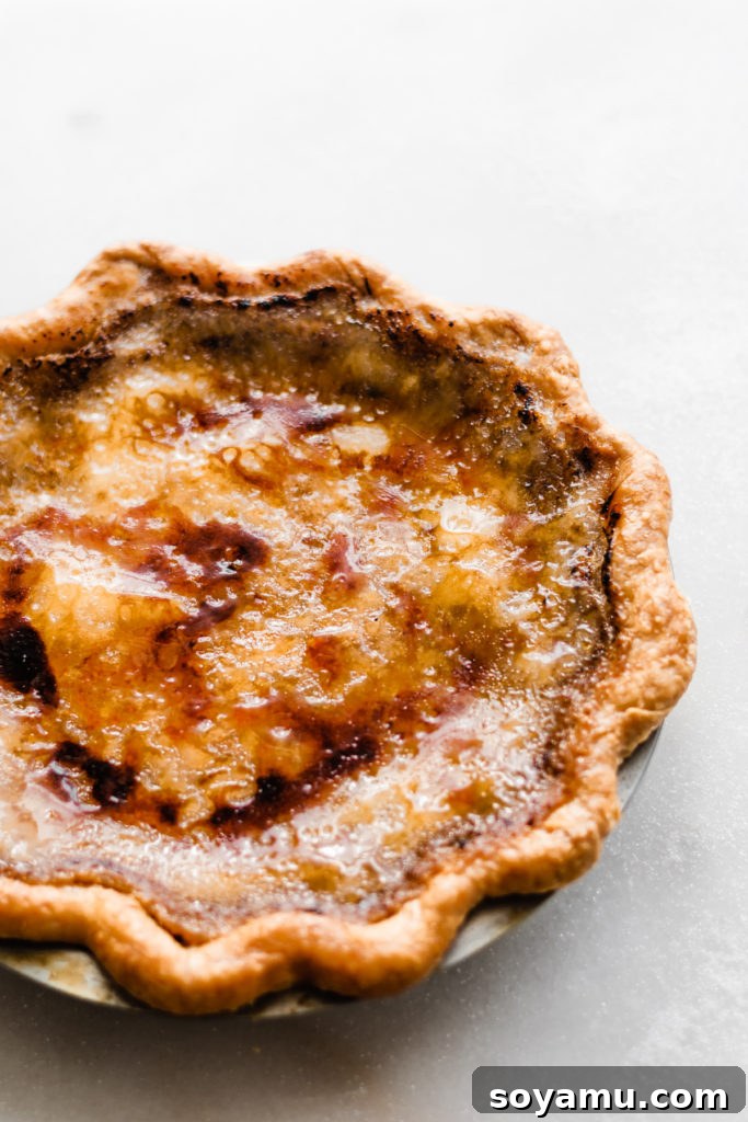Caramelizing sugar on maple pie for a perfect brûléed crust The mesmerizing process of brûléeing the sugar topping on the maple pie with a kitchen torch
