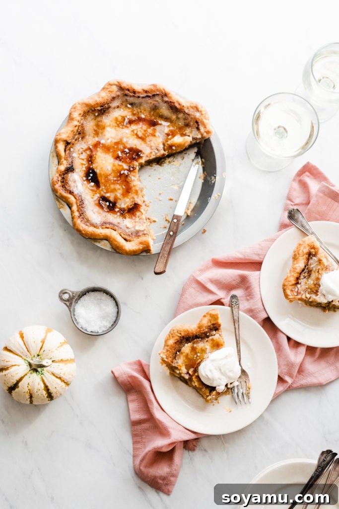 Flaky sea salt complementing the rich flavor of Brûléed Maple Pie Brûléed Maple Pie garnished with flaky sea salt, showcasing the crunchy sugar layer