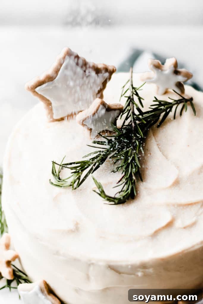 Snow-like sanding sugar on Winter Wonderland Cake Decorating the top of the cake with white sanding sugar