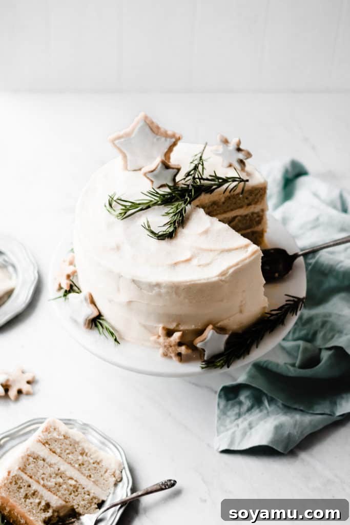 Caramelized White Chocolate Winter Wonderland Cake as a holiday centerpiece Beautifully decorated Caramelized White Chocolate Winter Wonderland Cake on a festive table