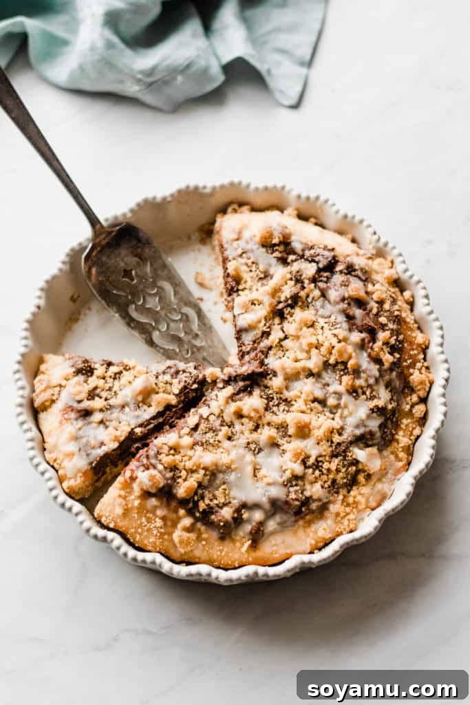 Nutella pizza topped with a white chocolate glaze. 