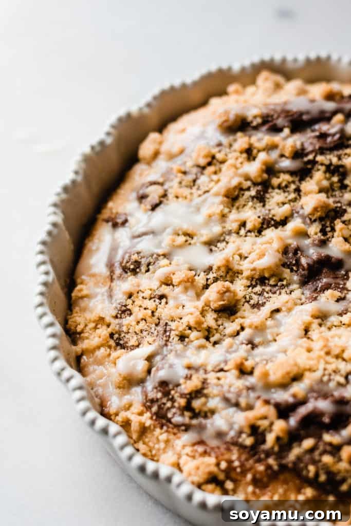 A close-up on the nutella pizza with white chocolate glaze.