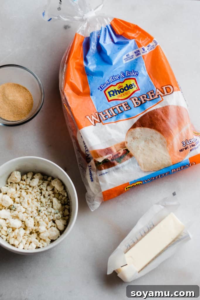 Rhodes package of white bread dough next to a bowl of crumbled cheese, ready for preparation.