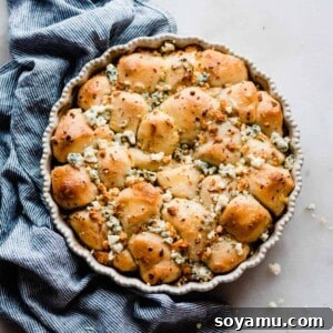 Delicious Cheesy Baked Bread Bites in a serving dish.