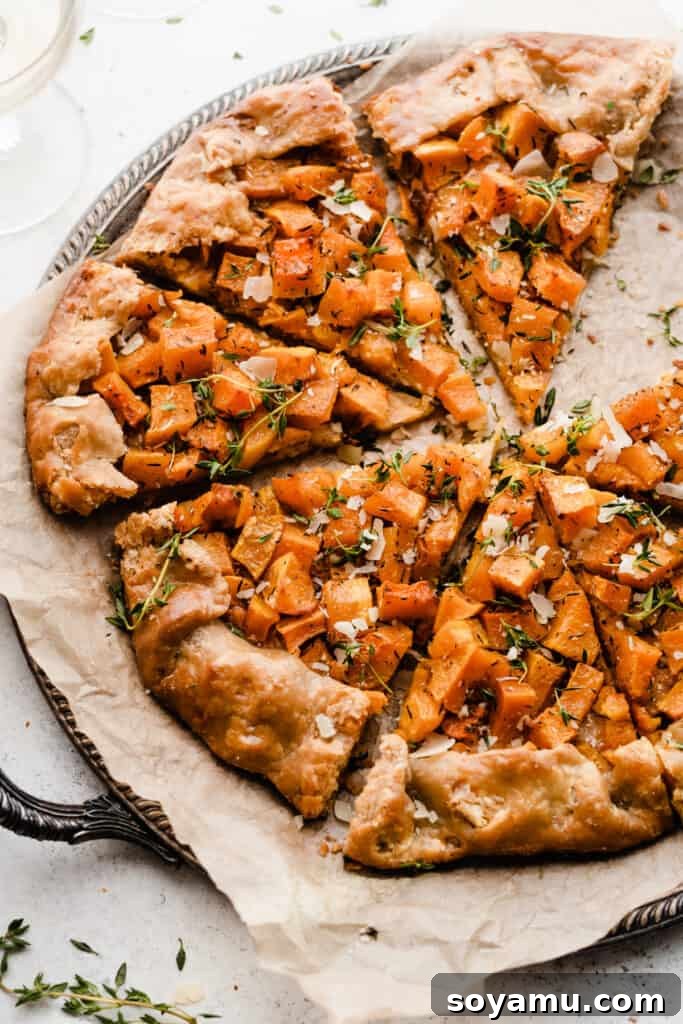 The Easiest 3-Ingredient Pie Crust Ever 20 Sliced butternut squash galette on a pan, with flaky homemade pie crust.