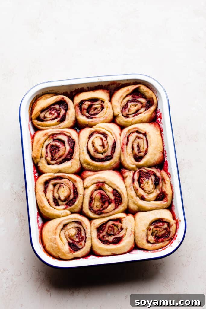 Tangy Raspberry Lemon Morning Buns with Cream Cheese Glaze 9 A pan of perfectly baked sweet rolls, golden brown and fragrant, before the cream cheese icing is applied.