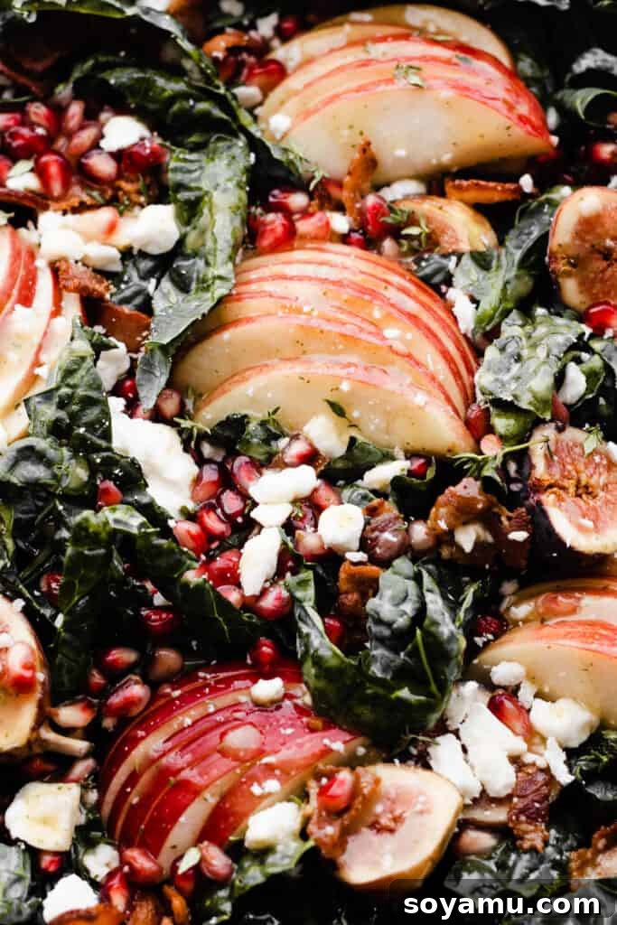Autumns Best Apple Recipes Fresh from the Orchard 7 A captivating close-up of a vibrant Honeycrisp Apple and Kale Salad, showcasing its fresh ingredients and rich colors.