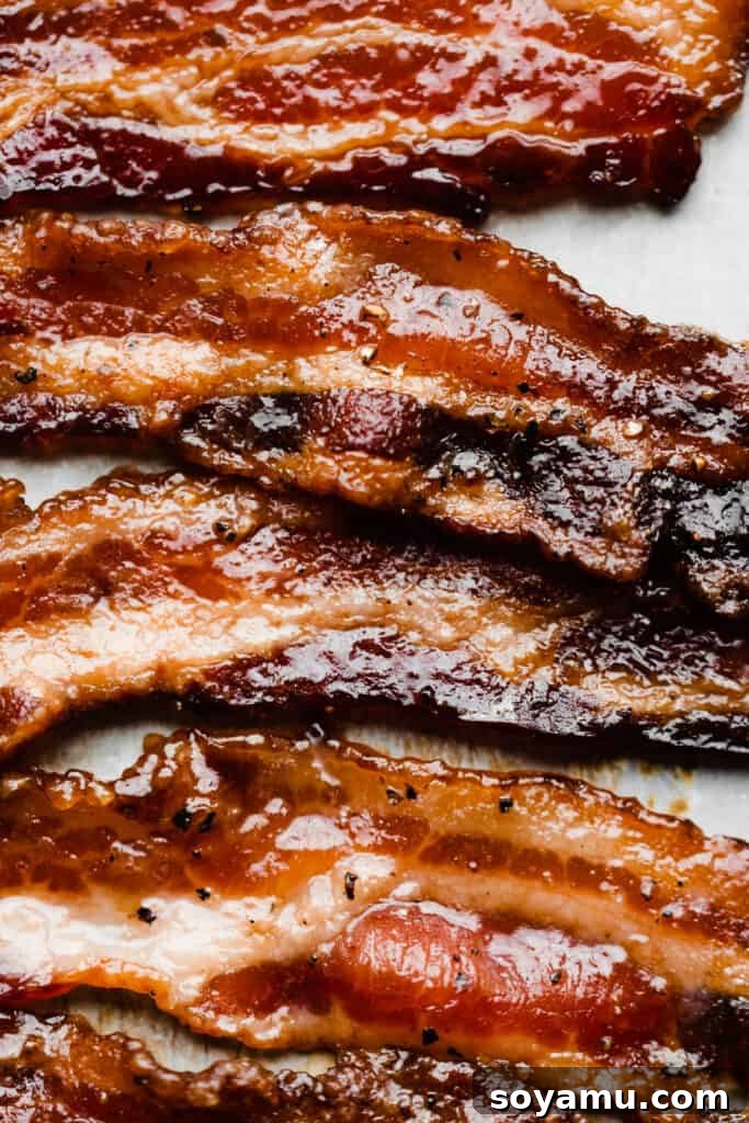 Brown Butter Maple Bacon Perfection 4 A close-up of slices of candied bacon.