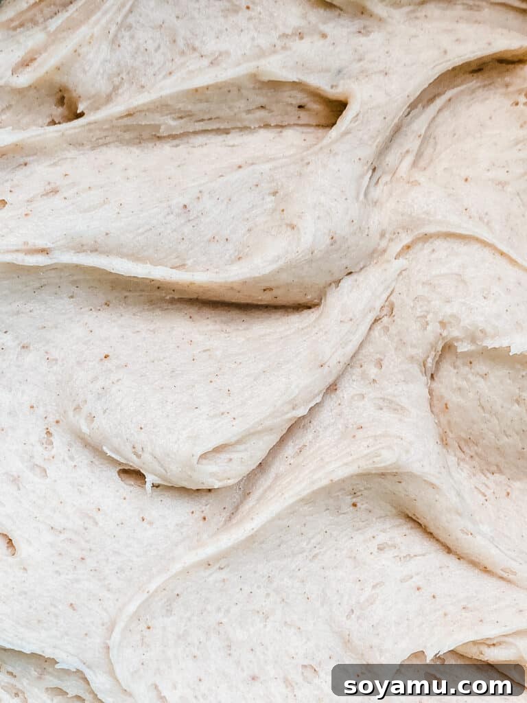 Brown Butter Maple Bacon Perfection 7 A close-up of swirls of brown butter cream cheese frosting.