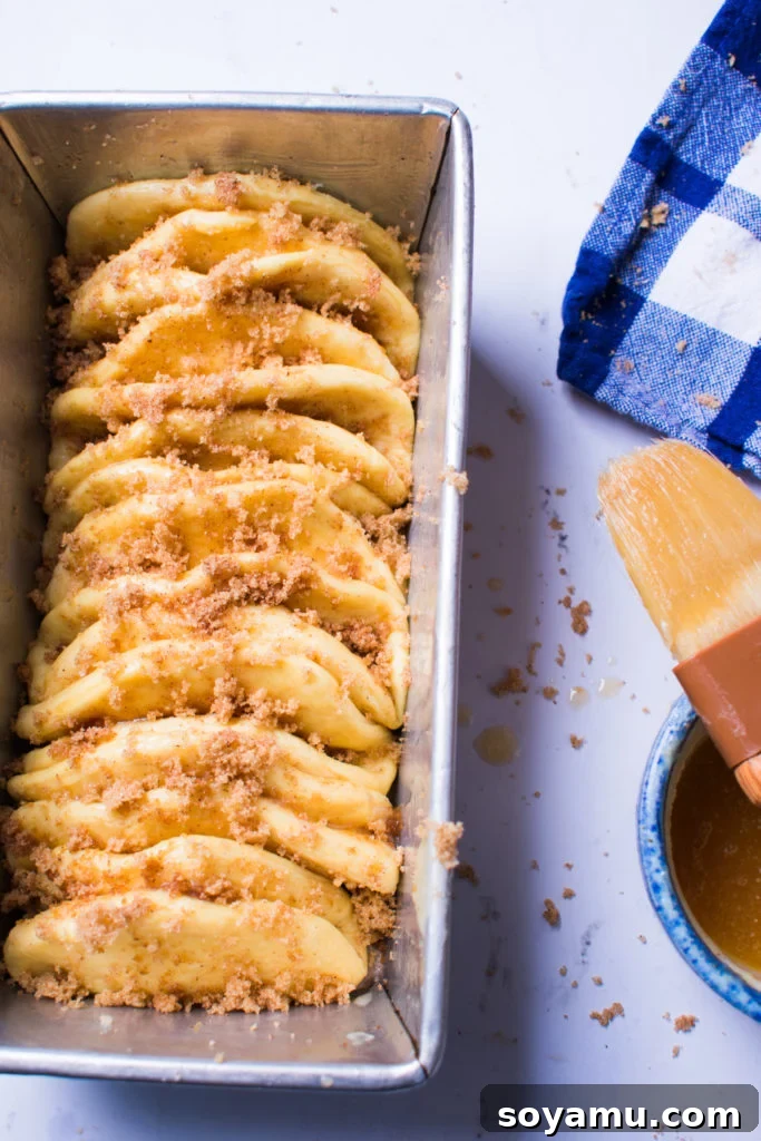 Maple Glazed Pull-Apart Bread - Drizzling the maple glaze Maple Glazed Pull-Apart Bread with Glaze Pour