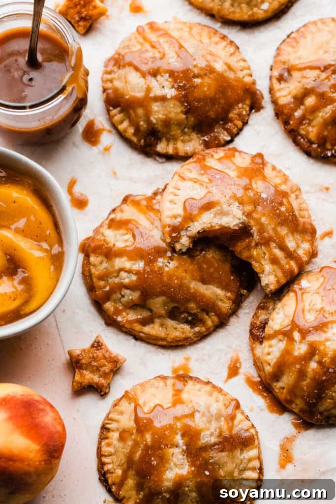 Salted Caramel Peach Mini Pies 3 Salted caramel sauce drizzled over peach hand pies.