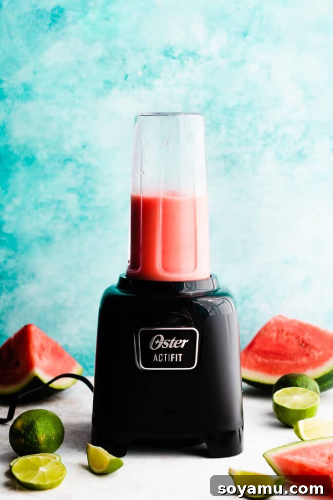 Watermelon Wave Frozen Margaritas 6 A blender with the blended margarita.