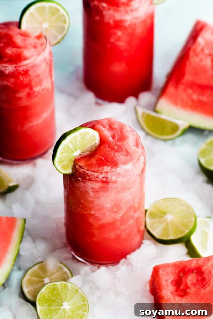 Watermelon Wave Frozen Margaritas 7 A top-down view of three glasses of the bright pink drinks.