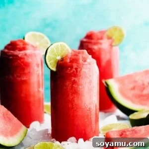 Watermelon Wave Frozen Margaritas 9 Three glasses of bright pink watermelon margaritas.