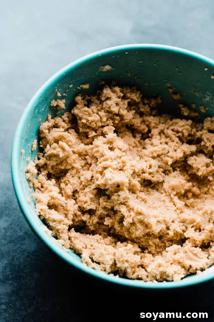 Gooey S'mores Skillet Cookie 4 A mixing bowl full of rich, soft cookie dough, ready for mix-ins.