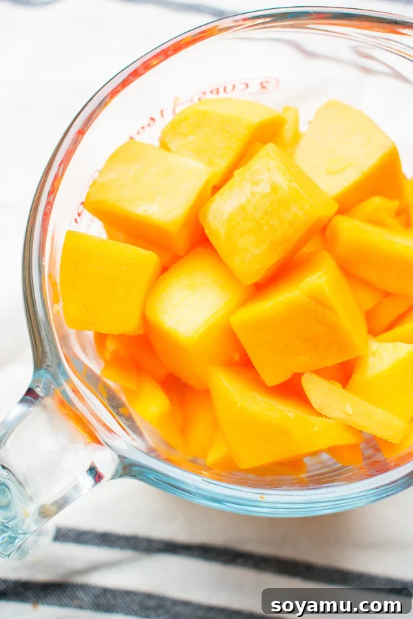 Cooked butternut squash cubes ready to be mixed into the healthy chicken wild rice casserole.