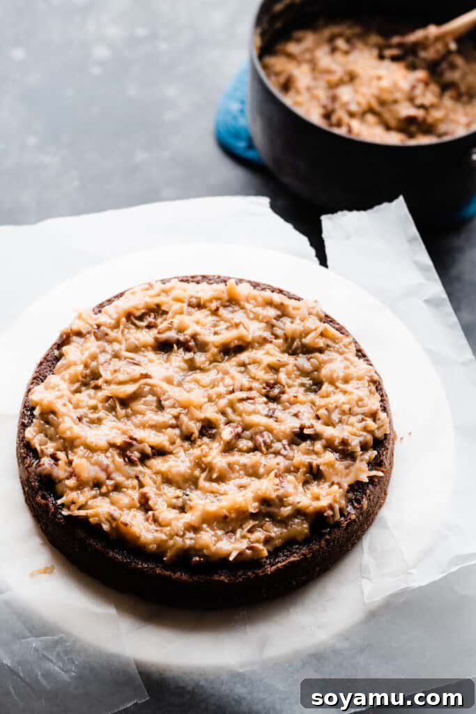 A single layer of the moist chocolate cake, generously spread with a thick layer of the luscious coconut pecan frosting.