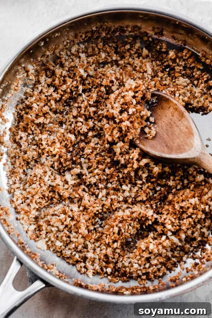 Creamy White Cheddar Mac with Crispy Brown Butter Crumbs 7 A pan of golden brown butter toasted panko breadcrumbs, perfectly crispy and aromatic.