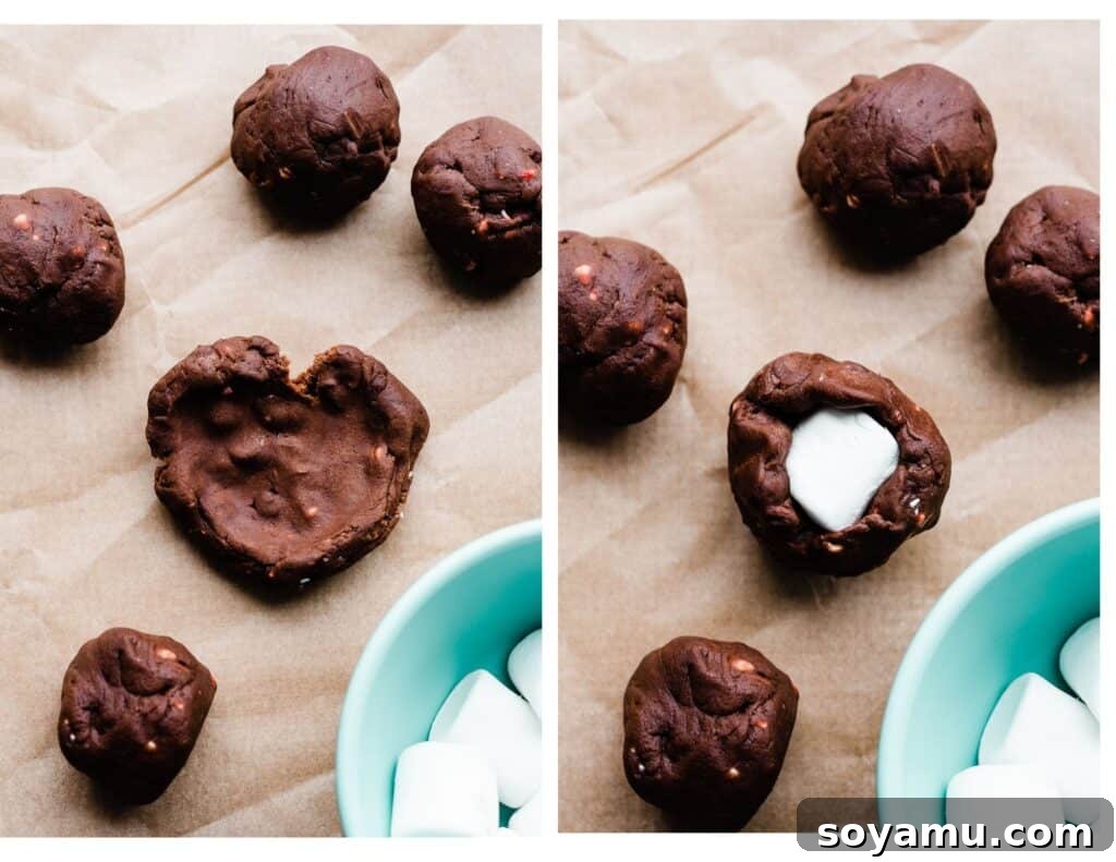 Two images: one shows a flattened cookie dough ball ready for a marshmallow, the other shows the dough expertly wrapped around a marshmallow with a small peek of white on top.
