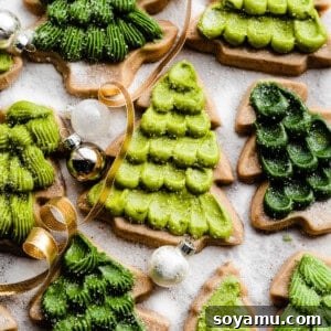 Honey Cream Dream Cookies 12 Honey cutout cookies decorated like evergreen trees on a sugary backdrop.