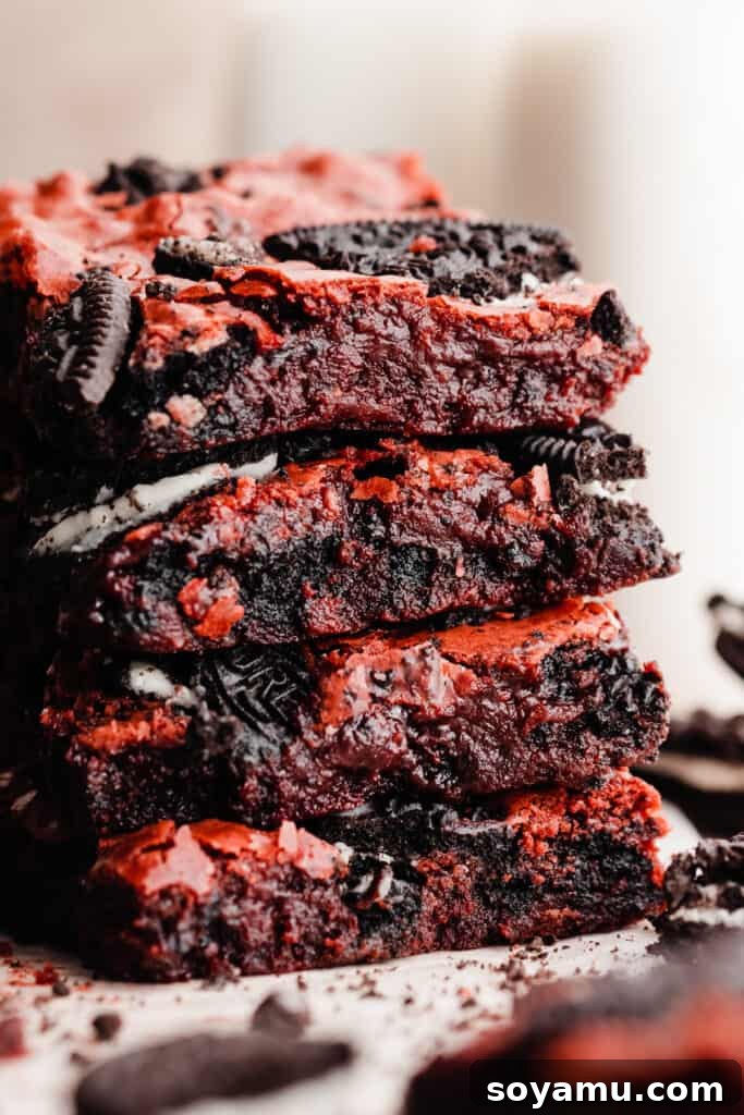 Velvet Swirl Oreo Fudge Brownies 2 A close-up on a stack of the fudgy red velvet brownies.