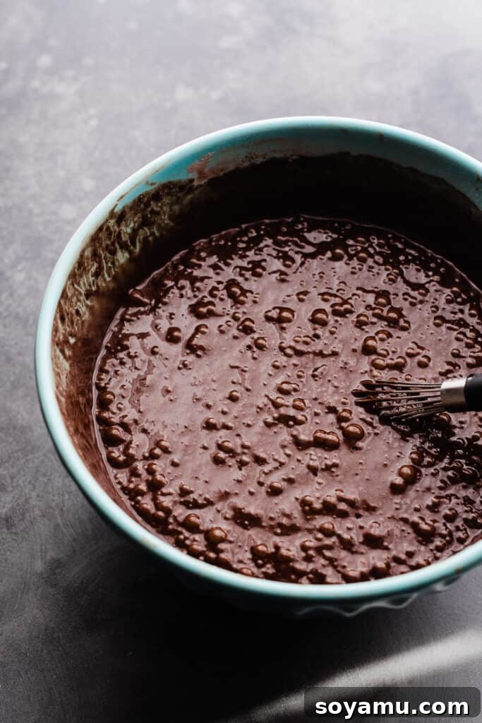 Velvet Chocolate Truffle Cake with Creamy Milk Chocolate Frosting 5 A bowl of chocolate cake batter.