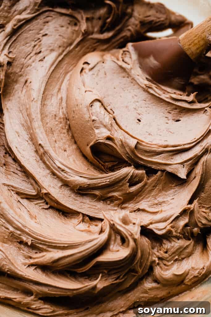 Velvet Chocolate Truffle Cake with Creamy Milk Chocolate Frosting 7 A close-up of the milk chocolate frosting.