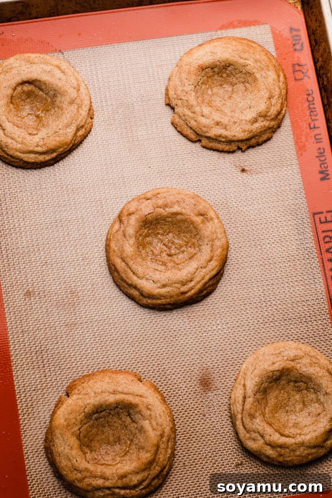 Salted Caramel Apple Pielettes 9 The baked cookies on a cookie sheet.