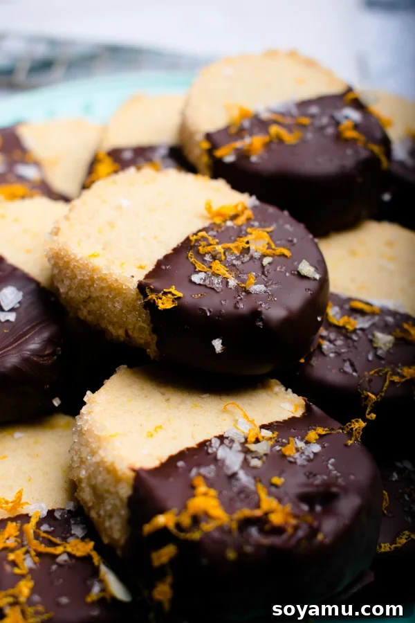 Detailed shot of the cookie texture and toppings Another view of the finished salted dark chocolate orange shortbread cookies