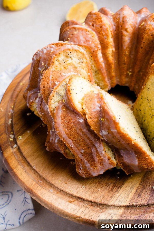 Freshly baked Lemon Poppy Seed Bundt Cake on a cooling rack, before glazing