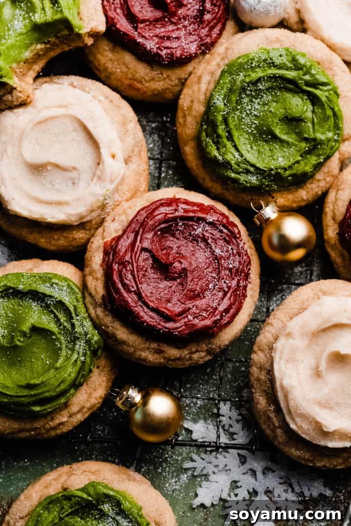 Ultra Chewy Frosted Sour Cream Cookies 12 The frosted sour cream cookies arranged beautifully on a vintage wire rack, highlighting their festive colors.