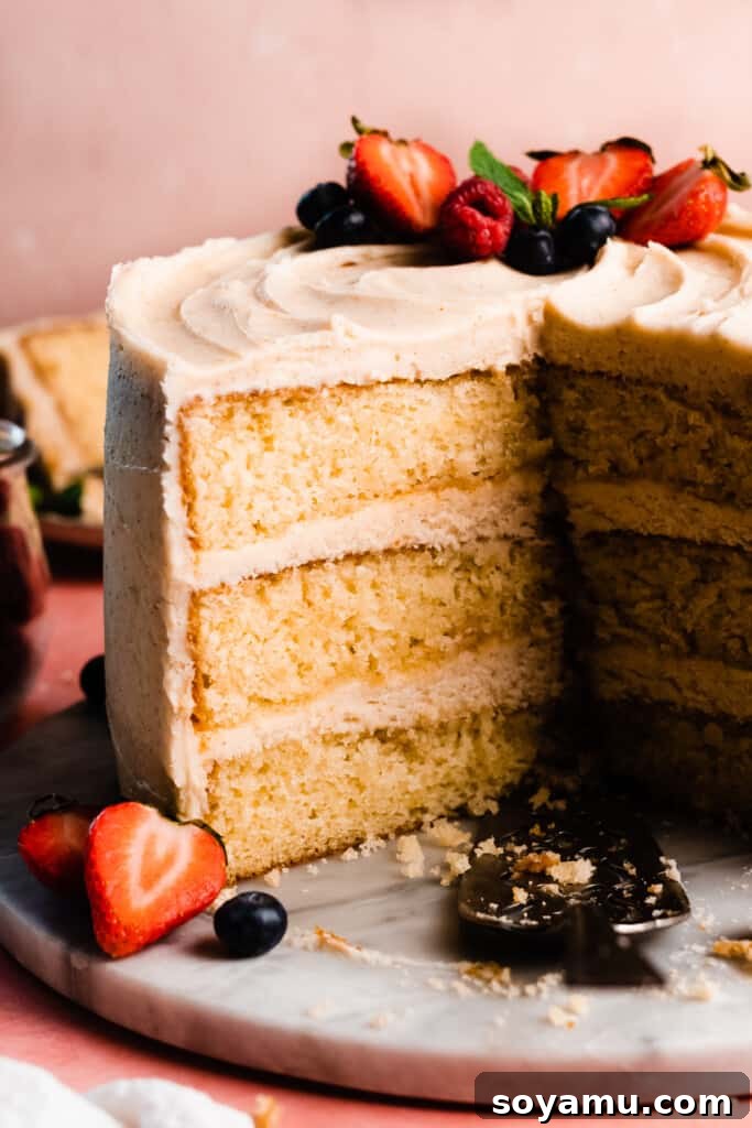 Decadent 8-inch Vanilla Cake with Golden Brown Butter Frosting 11 A close-up of the inside of the sliced 8-inch cake.
