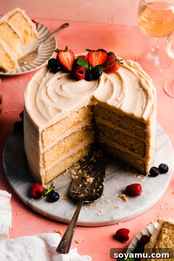 Decadent 8-inch Vanilla Cake with Golden Brown Butter Frosting 12 A top down view of the sliced vanilla cake.