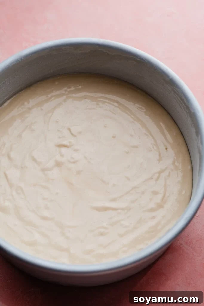 Decadent 8-inch Vanilla Cake with Golden Brown Butter Frosting 6 Vanilla cake batter in a pan.