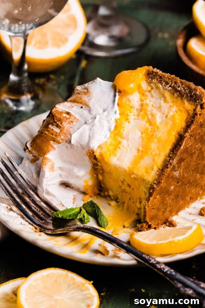 A beautiful slice of lemon cheesecake on a cake plate, showing off its thick, creamy texture and golden crust, with a few bites missing, inviting indulgence.