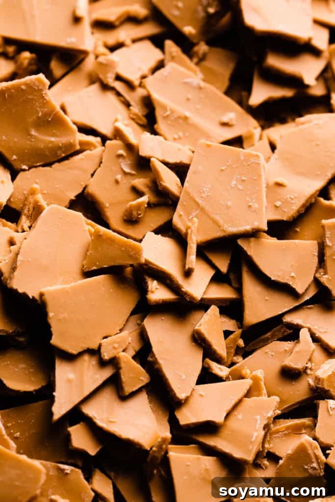 Unlocking the Flavor of Caramelized White Chocolate 2 A close-up of golden-brown chunks of perfectly caramelized white chocolate, ready to be enjoyed or used in desserts.