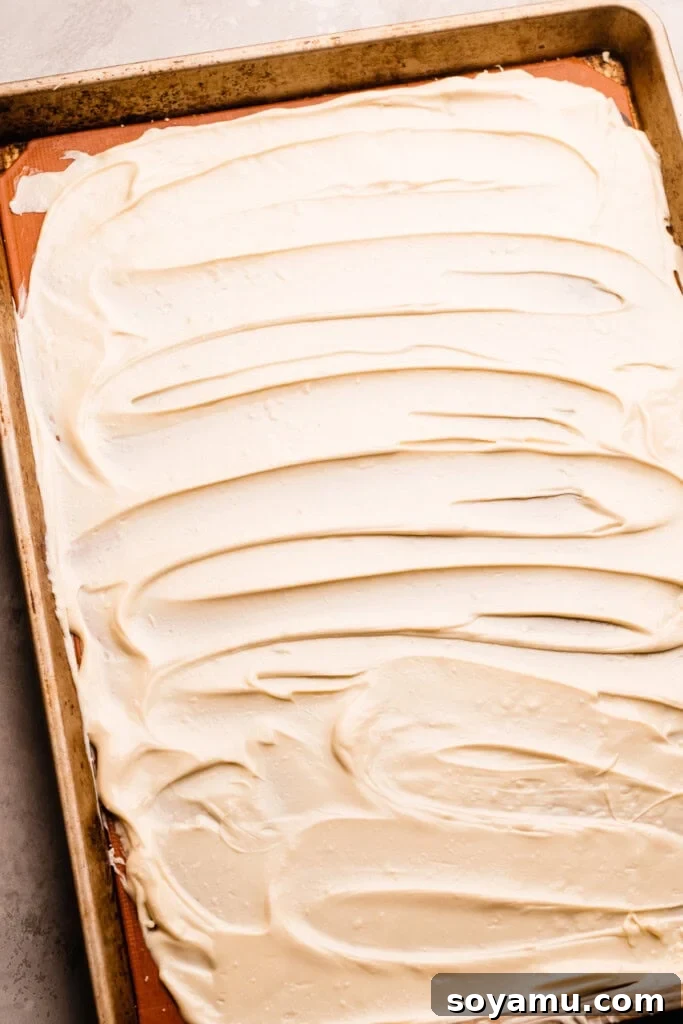 Unlocking the Flavor of Caramelized White Chocolate 5 Caramelized white chocolate approximately halfway through the roasting process, showing a light tan or beige color as it begins to develop its rich flavor.